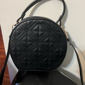 Black circular cross body new without tags
